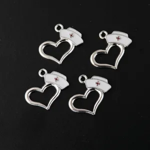 Alloy enamel nurse hat hollow heart pendant DIY craft jewelry making accessory components charm