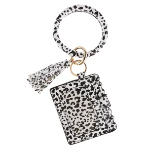 Black and white leopard print PU leather wristlet card holder keychain with tassel and ring.
