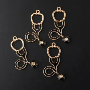 Gold and black stethoscope alloy enamel pendants for DIY handmade necklaces and bracelets.