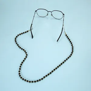 Cadenita de gafas con cuentas negro oro elegante soporte para lentes cordon para mujeres