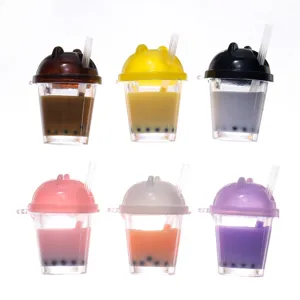 Miniature resin boba milk tea cup charms with bear lids, cute DIY phone case pendants.