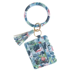 PU leather wristlet keyring card holder with tropical flamingo pattern and tassel pendant.