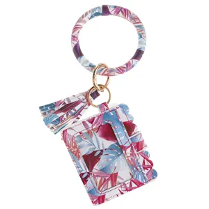 Tropical leaf print PU leather wristlet keyring with card holder and chic tassel detail.