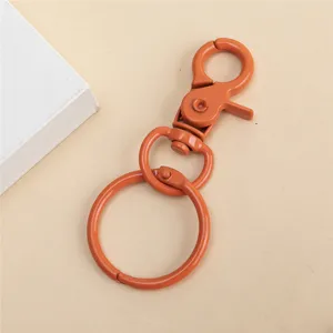 Mosquetón giratorio de metal de colores para llaveros bolsos de bricolaje accesorios diarios.