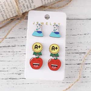 Wooden earrings set featuring cute science beakers A plus badges and smiling apple designs.