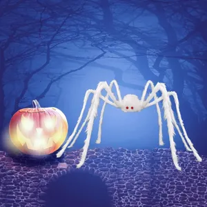 Halloween white plush spider and glowing pumpkin prop scene detail for horror party decor.