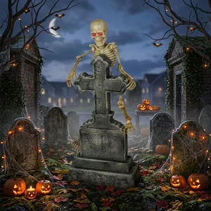 Detailed view of Halloween glowing skeleton tombstone prop with spooky LED lights and pumpkins.