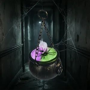 Décoration de chaudron magique suspendu d'Halloween avec lumières colorées et fausses araignées.