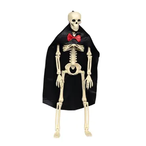 Halloween plastic skeleton decoration prop featuring a black cape and a red bowtie.