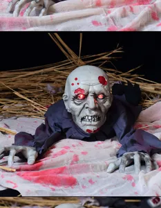 Halloween electric crawling zombie prop with glowing red eyes and scary sound for haunted house.