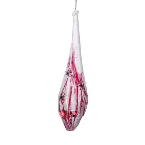 Halloween hanging bloody skull prop with spider web and glowing red eyes for spooky decor.