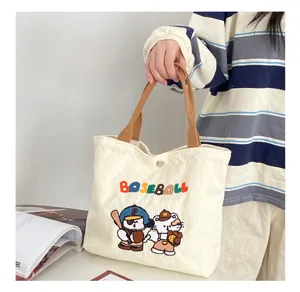 Corduroy tote bag with cute baseball cartoon embroidery, casual small handbag for women daily.