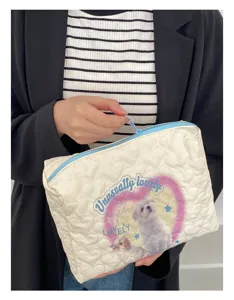 Large capacity quilted cosmetic bag with cute puppy print and blue zipper for daily use.