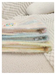Cozy knit plush cosmetic pouch with pastel stripes and metal zipper for daily portable storage.