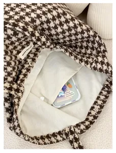 Brown houndstooth wool tote bag interior detail view, chic casual daily shopper handbag.