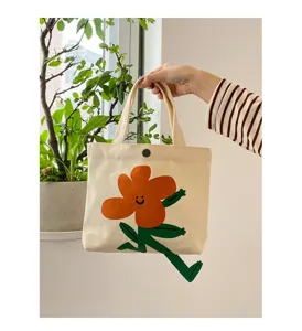 Süße Canvas Handtasche für Damen, große Kapazität, niedliches orange Blümchen Motiv.