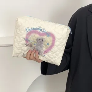 Quilted cosmetic bag with cute puppy print, large capacity portable storage pouch for women.