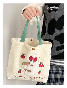 Cute corduroy tote bag with embroidered rabbit and cherry design, casual small handbag for women.