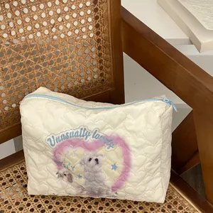 Quilted makeup bag with cute dog print, large capacity cosmetic pouch for travel and daily use.