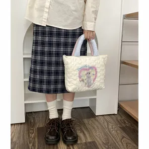 Niedliche gesteppte Handtasche für Damen, flauschige Plüschgriffe, lässiger Shopper, geräumig.