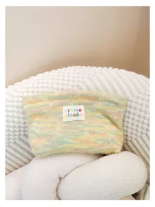 Cozy pastel knit makeup pouch with fuzzy texture, portable zippered toiletry storage bag.