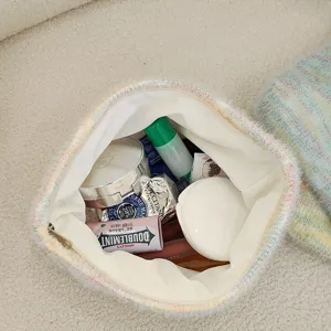 Plush knit cosmetic bag for women, soft fuzzy makeup pouch and portable zip purse for daily use.