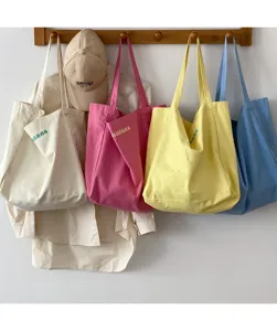 Casual canvas tote bag, large capacity daily shoulder bag in cream color for women.