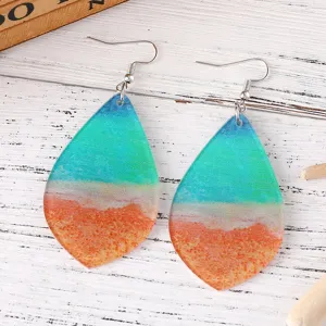 Magnifiques boucles d'oreilles en acrylique en forme de goutte au dégradé bleu vert et orange.