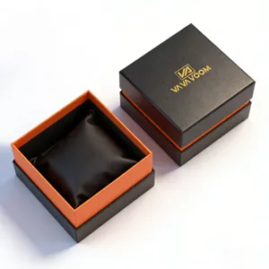 Schwarze und orangefarbene Uhrengeschenkbox mit Kissen zur Schmuckaufbewahrung und Präsentation.