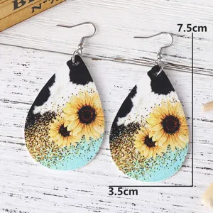 Western-Stil Kuhmuster Sonnenblume Tropfen Leder Ohrringe Detailansichtzeigen
