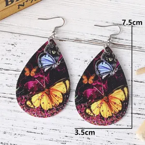 Wunderschöne Schmetterling PU Leder Tropfen Ohrringe Detail, stilvoller Sommerschmuck für Frauen.