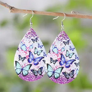 Blau Schmetterling Tropfen PU Leder Ohrringe haengend an Zweig Hauptprodukt Ansicht