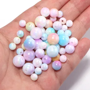 Close-up of colorful AB color gradient acrylic beads, ideal for DIY handmade bracelets and jewelry.