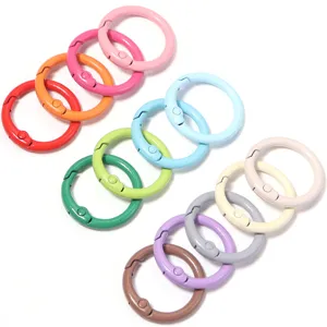 Colorful metal spring snap rings, key rings and bag accessory clasps for DIY jewelry making.
