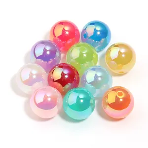 Close-up detail of 16mm colorful iridescent acrylic beads for DIY jewelry making and crafts.