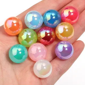 Close-up of colorful iridescent acrylic beads for DIY jewelry making and pen accessories