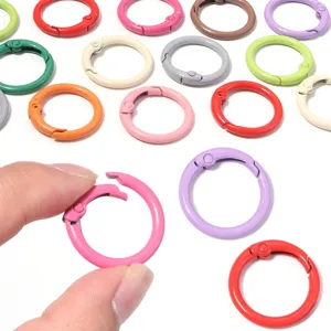 Colorful metal spring rings for keychains and bag straps, easy open gate design DIY crafts.