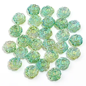 Close-up detail of iridescent green rose acrylic beads for DIY handmade jewelry and bracelets.