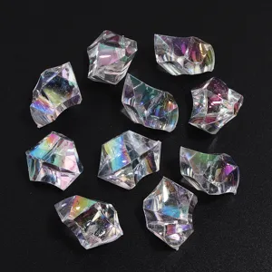 Close-up view of irregular acrylic iridescent ice stones displaying colorful reflections.