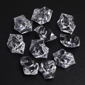 Close up of clear acrylic simulated ice cubes crystal stones for DIY craft detail view.