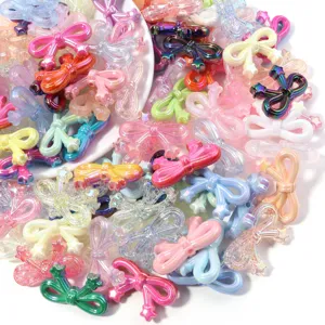 Close-up of colorful acrylic star bow beads, ideal for DIY bracelets and keychains.