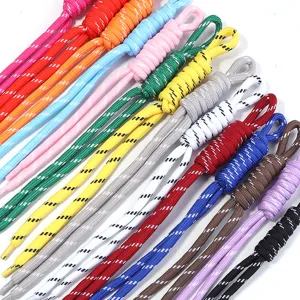 Detailed view of colorful nylon braided cords with reflective threads, ideal for DIY crafts.