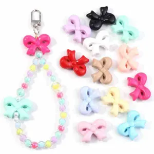 Acrylic colorful bow beads detail showcase, ideal for DIY phone charms, keychains and crafts.