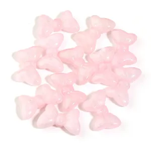 Pink acrylic bow beads glitter mermaid bow charms for DIY jewelry making and craft supplies.