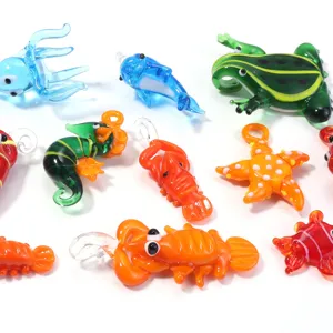 Handmade glass animal pendants detailed view, colorful sea creatures charms and figurines.