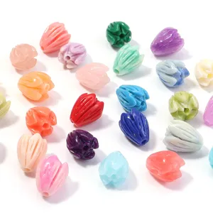 Detailed view of colorful tulip-shaped shell beads, perfect for DIY jewelry and accessories.