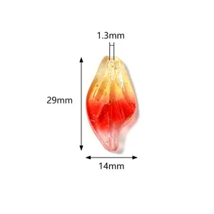 Glass leaf pendant detail view, colorful gold sand resin maple leaf DIY jewelry component.
