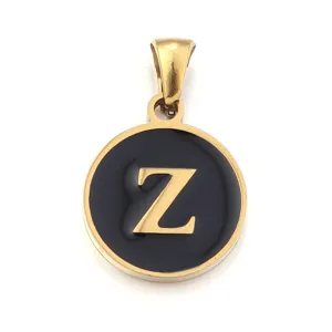 Close-up detail of a round stainless steel letter Z pendant with black enamel finish.