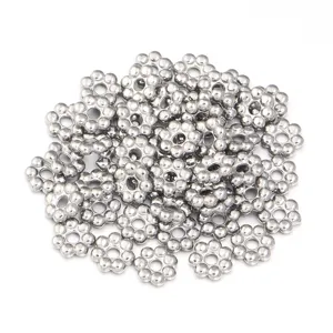 Stainless steel flower spacer beads, perfect for DIY jewelry making and handmade bracelets.