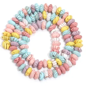 Colorful wooden abacus beads with flowing water patterns for DIY jewelry making detail.